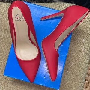 Brand new red heels
